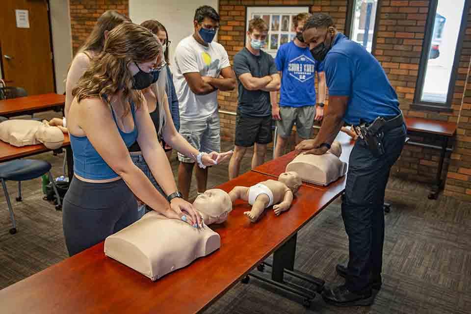 A DPS officer conducting CPR training