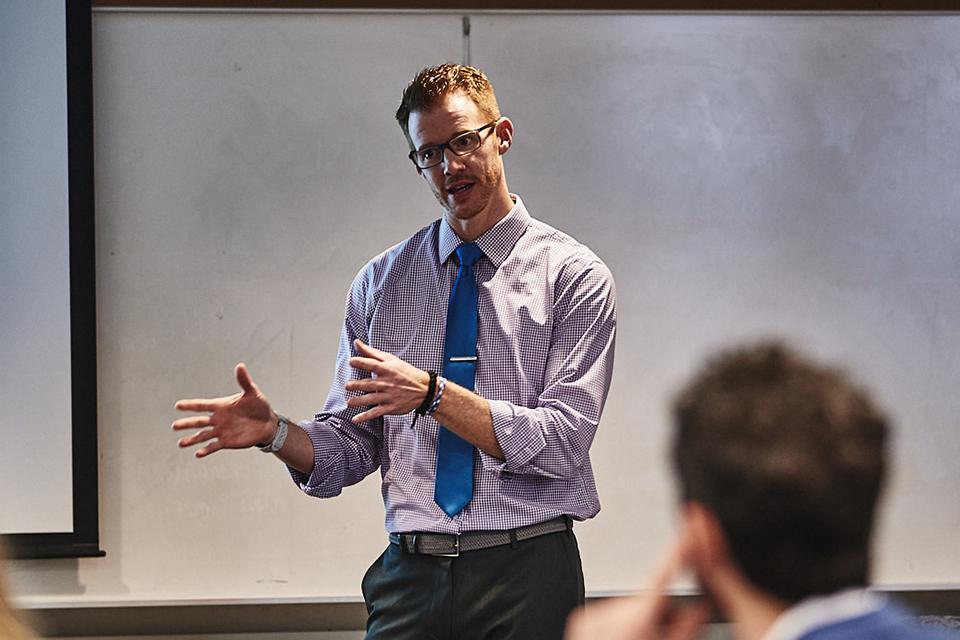 Brad Carlson, Ph.D. teaches a class in the Chaifetz School of Business at Saint Louis University.